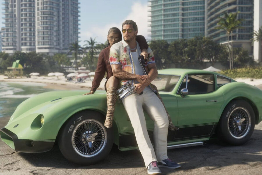 Nova imagem de GTA 6 mostrando um homem e uma mulher encostados em um carro com Vice City ao fundo.