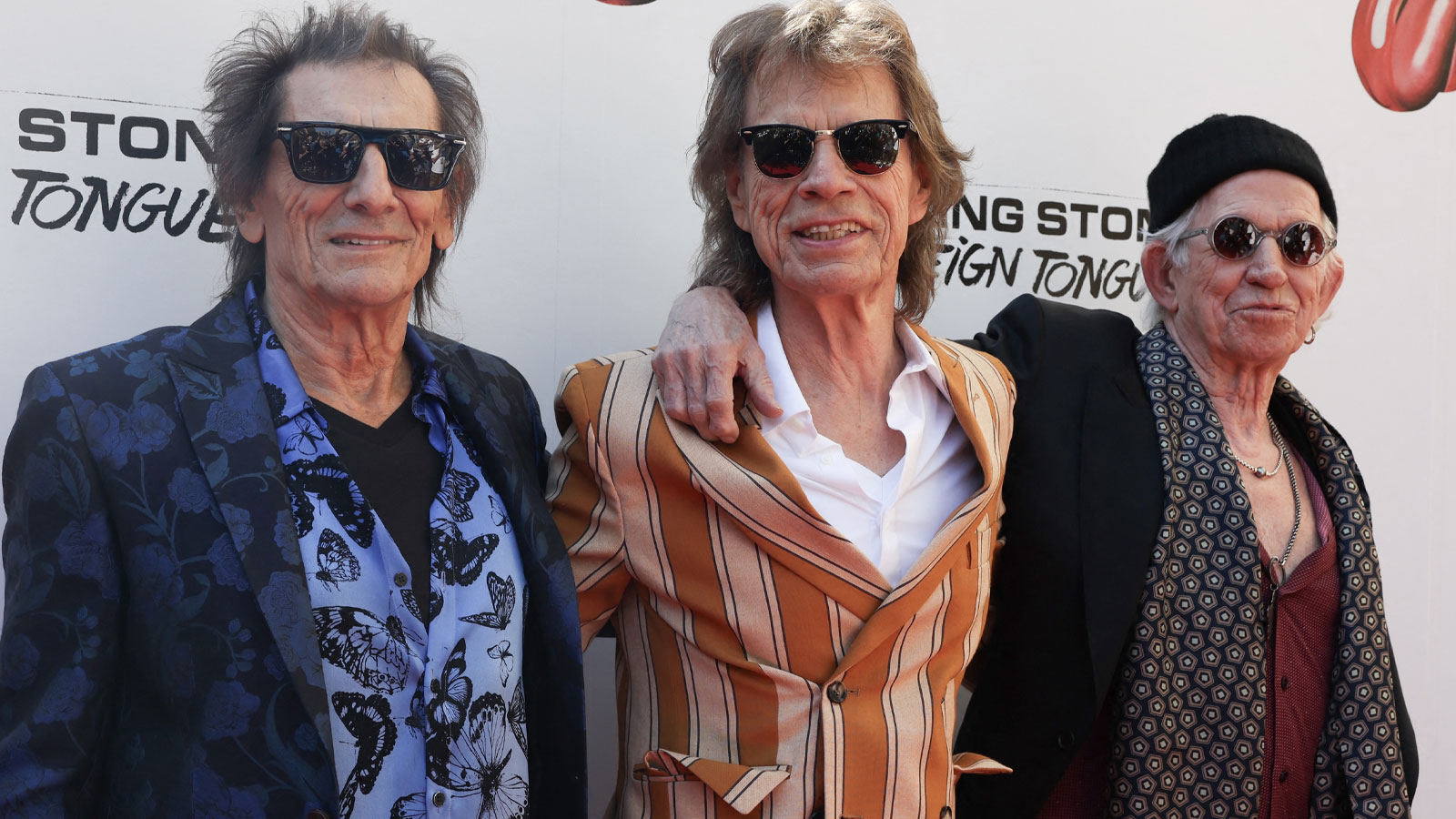 Três integrantes originais dos Rollings Stones posam para a foto
