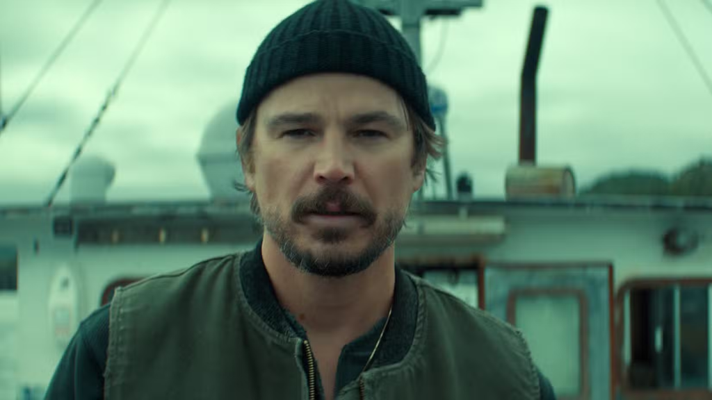 Josh Hartnett em cena da série Profundezas da Netflix, enfrentando uma criatura aterrorizante.